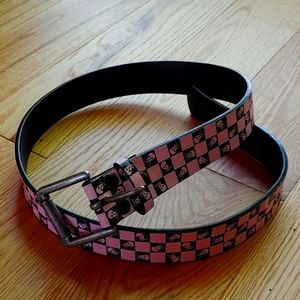 Philcos. Women's punk belt. Black and pink checkerboard with skulls. Size 32.